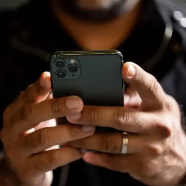Man using phone with his hands