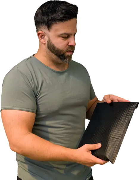 Man holding discrete packaging of Viking Man